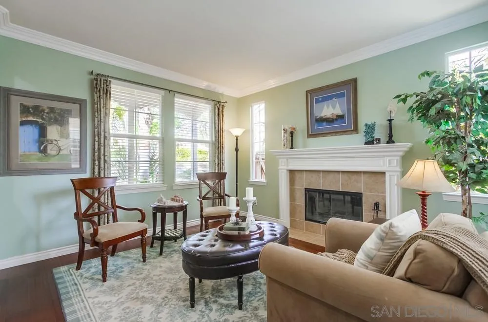 2665 Paradise Road Carlsbad, CA 92009 - Photo 2 of 52 a living room with furniture and a fireplace