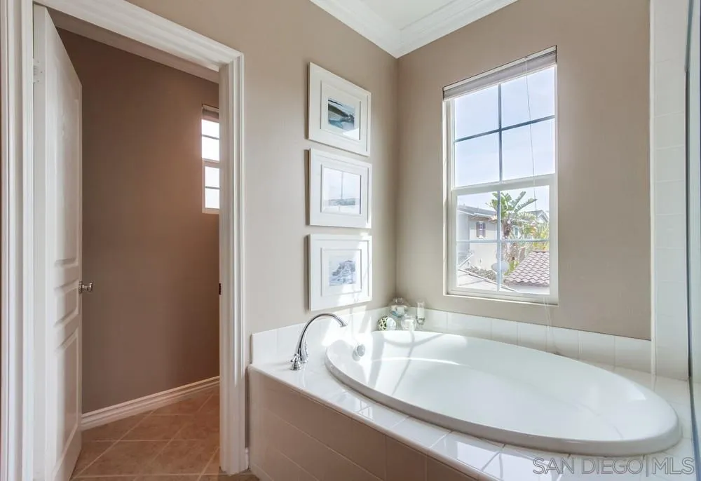 2665 Paradise Road Carlsbad, CA 92009 - Photo 24 of 52 a bathroom with a bathtub and a sink