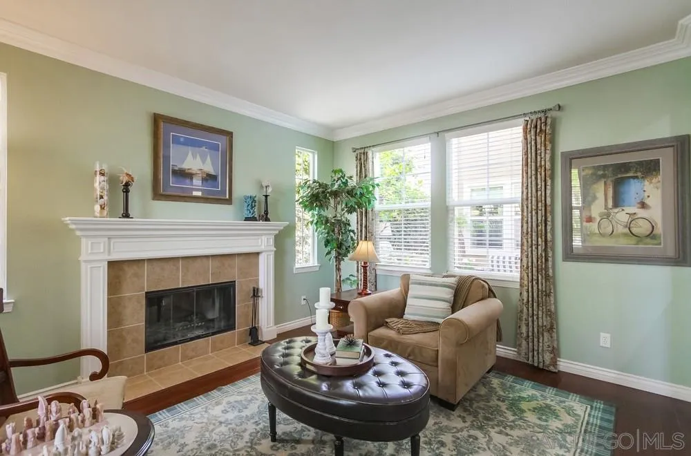 2665 Paradise Road Carlsbad, CA 92009 - Photo 3 of 52 a living room with furniture and a fireplace