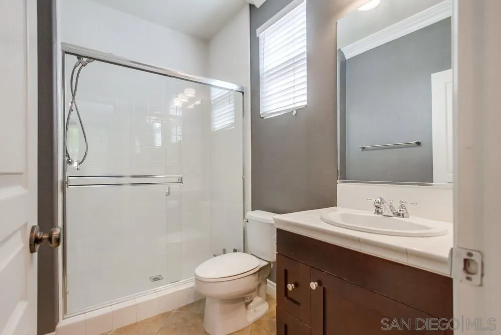 2665 Paradise Road Carlsbad, CA 92009 - Photo 32 of 52 a bathroom with a sink toilet and shower