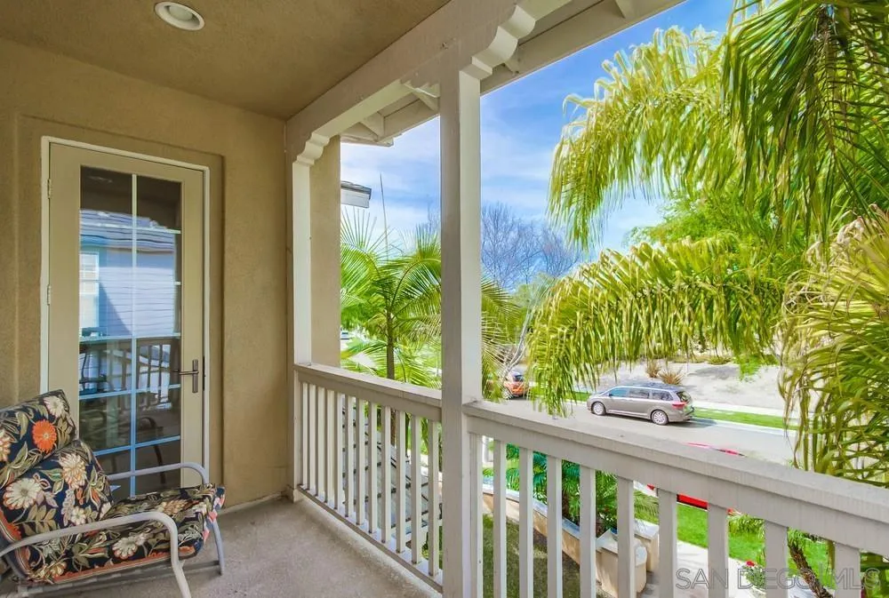 2665 Paradise Road Carlsbad, CA 92009 - Photo 36 of 52 a view of a porch with chairs and potted plants