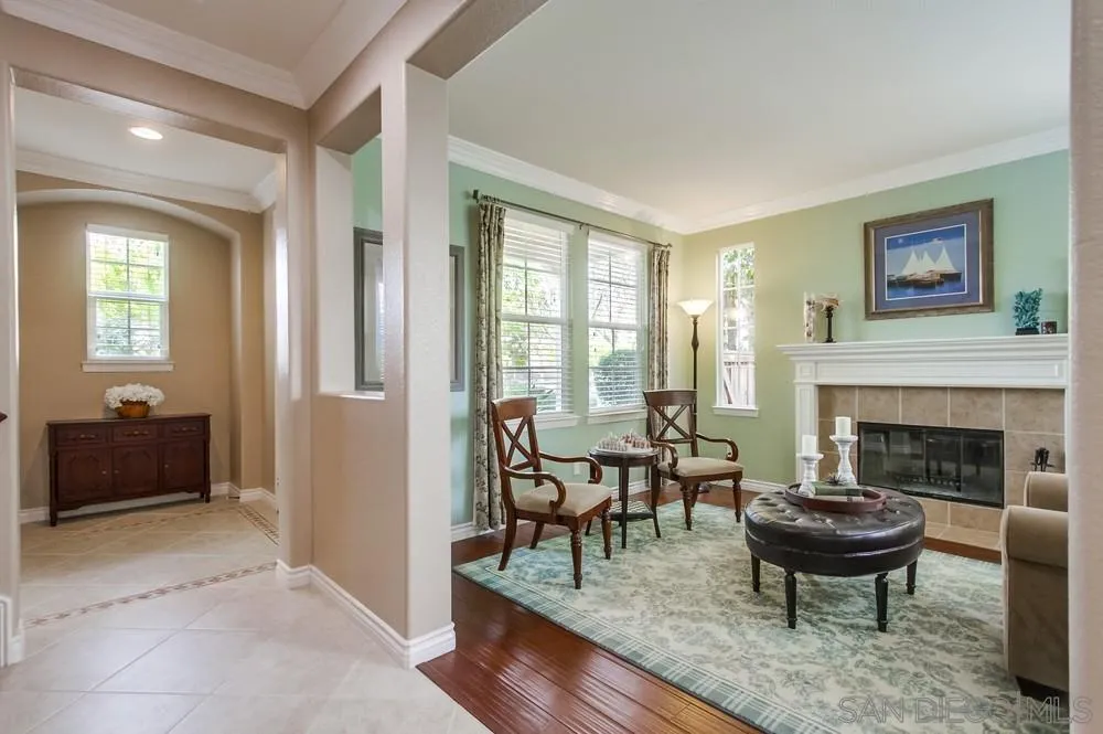 2665 Paradise Road Carlsbad, CA 92009 - Photo 5 of 52 a living room with furniture and a fireplace