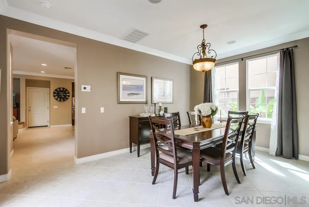 2665 Paradise Road Carlsbad, CA 92009 - Photo 7 of 52 a view of a dining room with furniture window and outside view