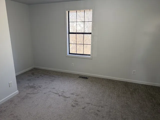 an empty room with a window