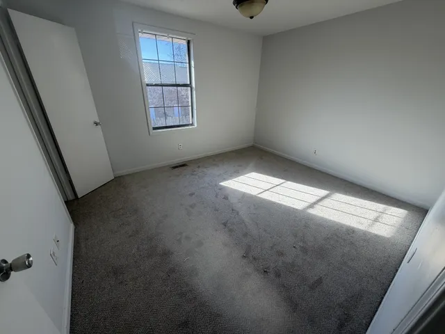 an empty room with windows