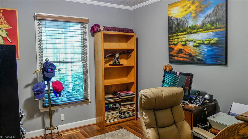1130 Flinty Knoll Road Pinnacle, NC 27043 - Photo 15 of 29 This third bedroom is currently being used as an office. Brand new flooring!