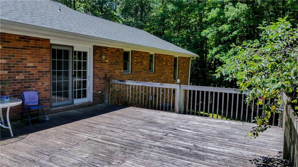 1130 Flinty Knoll Road Pinnacle, NC 27043 - Photo 28 of 29 Enjoy a drink after dinner on this spacious deck.