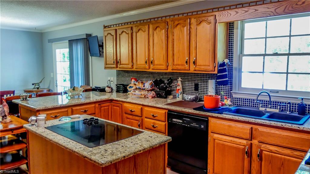 1130 Flinty Knoll Road Pinnacle, NC 27043 - Photo 8 of 29 This spacious, updated kitchen provides plenty of room for meal prep and seating!