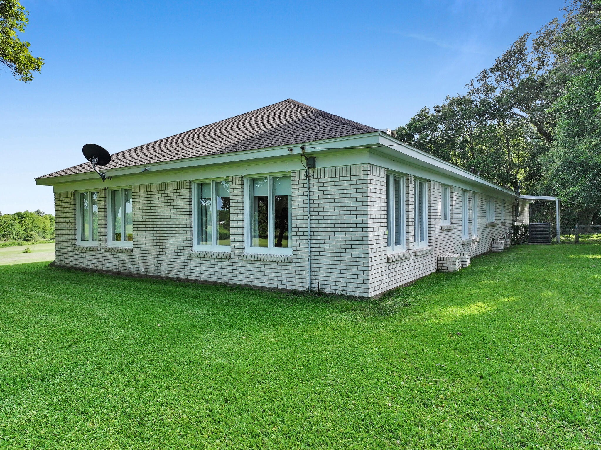 1212 High School Road Port Bolivar, TX 77650 - Photo 16 of 50 a view of a back yard of the house
