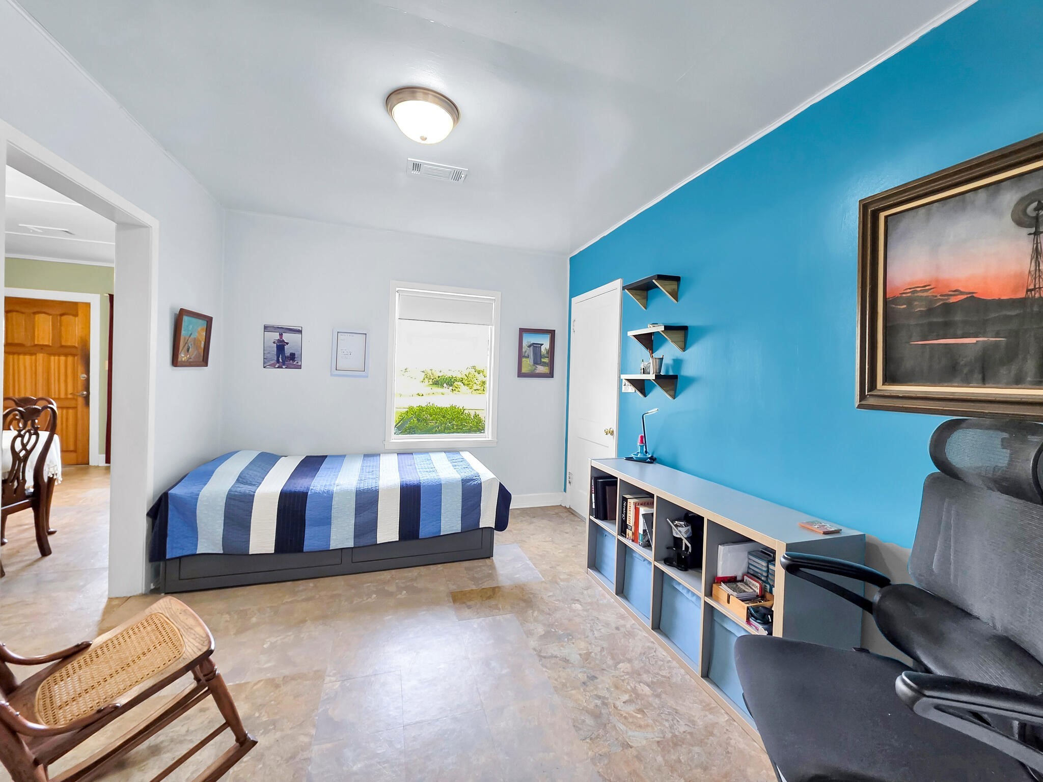 1212 High School Road Port Bolivar, TX 77650 - Photo 29 of 50 a living room with furniture and paintings on the wall