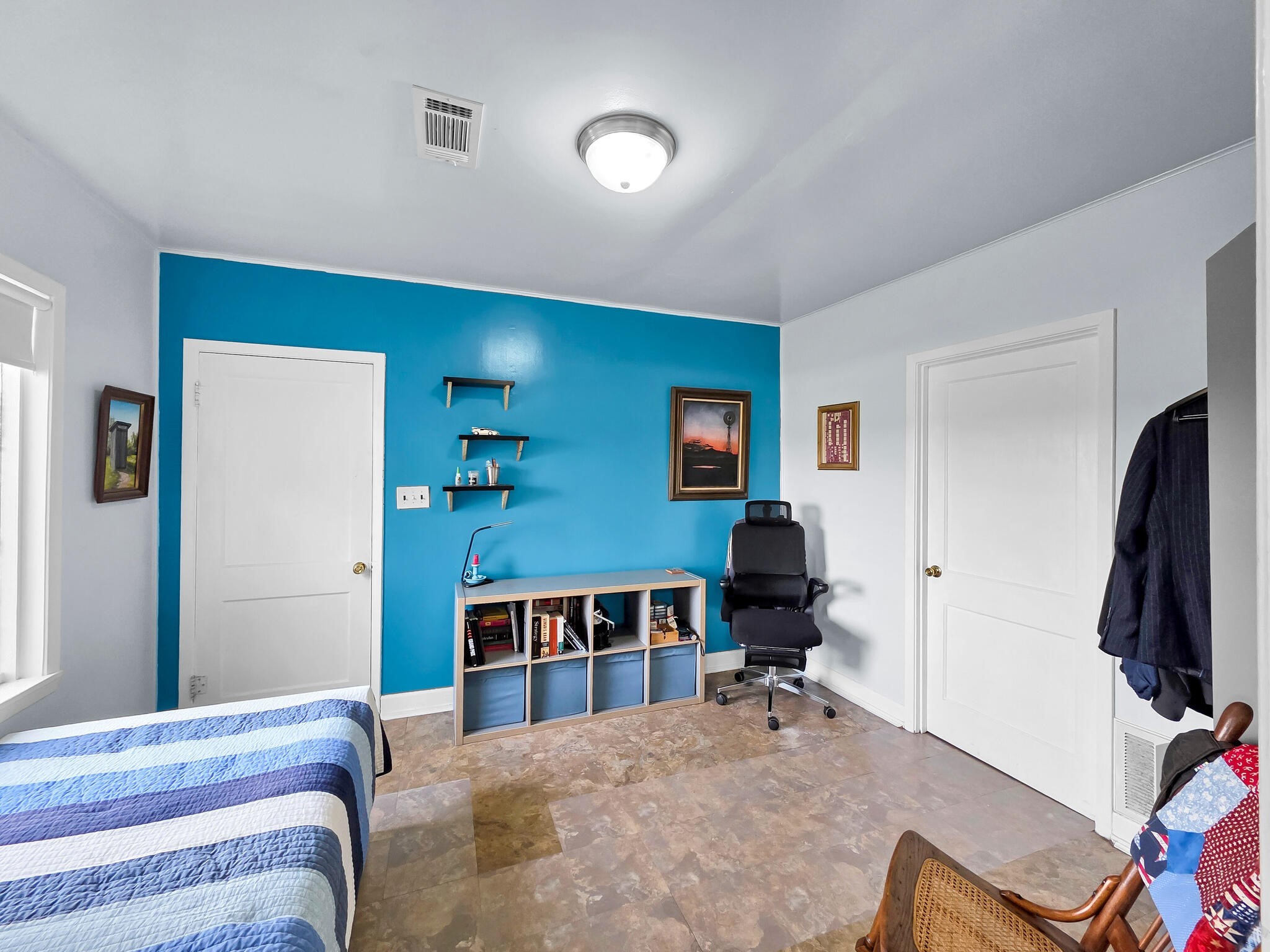 1212 High School Road Port Bolivar, TX 77650 - Photo 30 of 50 a bedroom with a bed and a flat screen tv