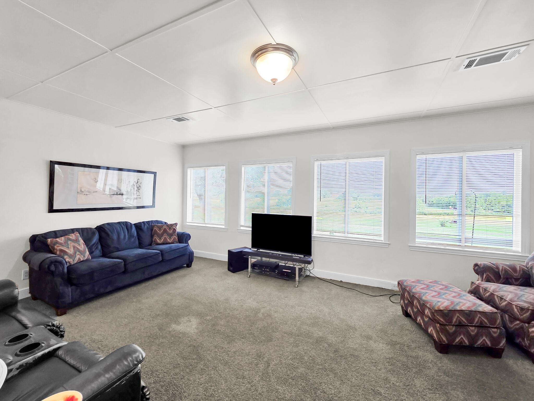1212 High School Road Port Bolivar, TX 77650 - Photo 42 of 50 a living room with furniture window and flat screen tv