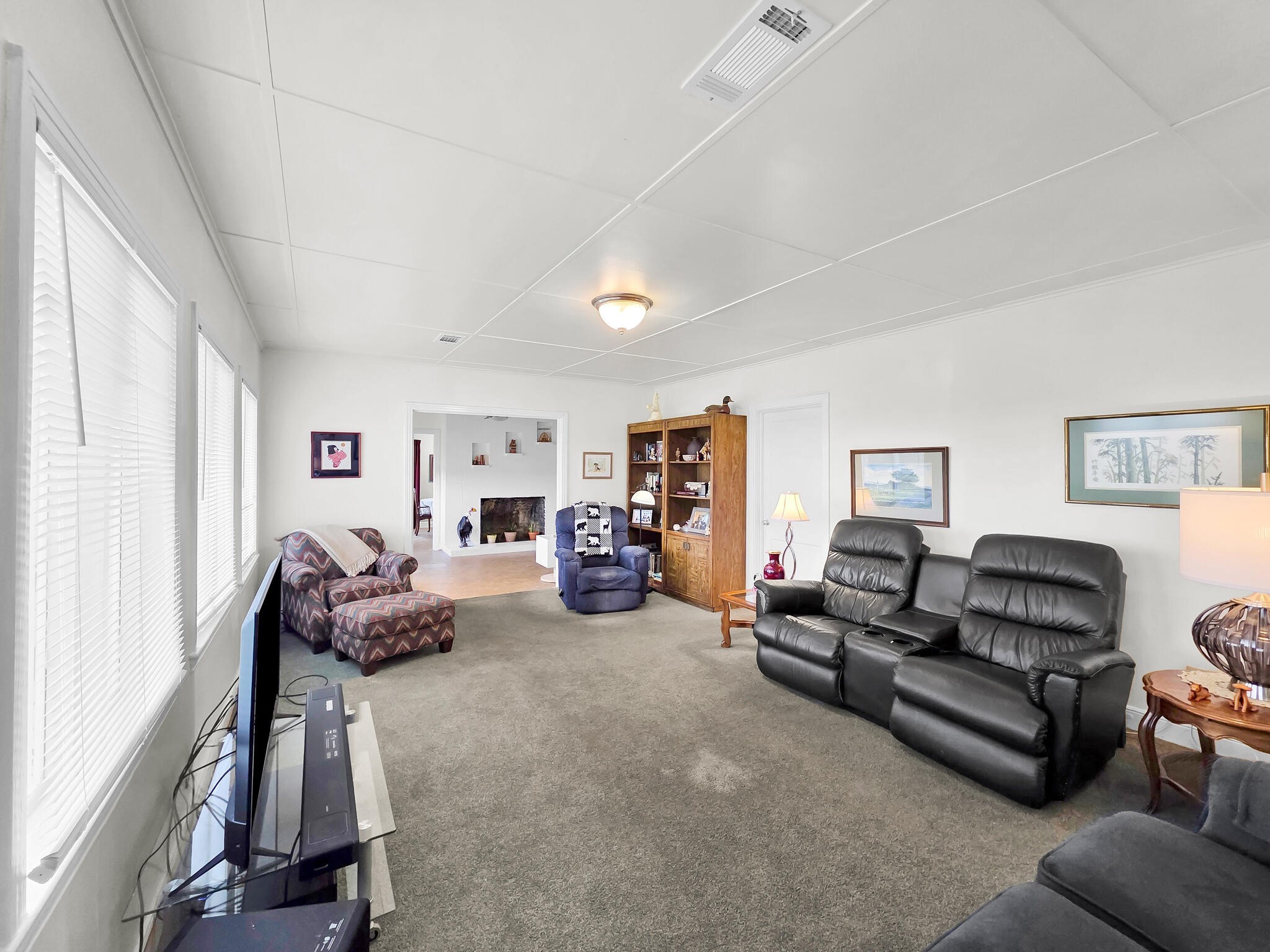 1212 High School Road Port Bolivar, TX 77650 - Photo 44 of 50 a living room with furniture and a flat screen tv