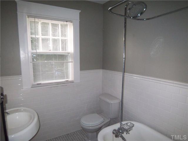 912 West Johnson Street Raleigh, NC 27605 - Photo 11 of 12 a bathroom with a toilet and a sink
