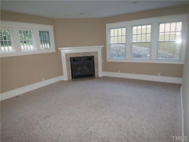 912 West Johnson Street Raleigh, NC 27605 - Photo 6 of 12 an empty room with windows