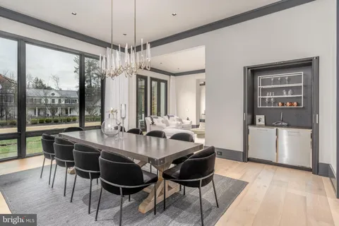 a view of bathroom with a sink and mirror