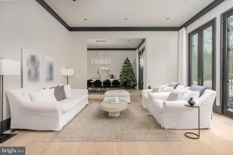 a kitchen with stainless steel appliances white cabinets and a sink