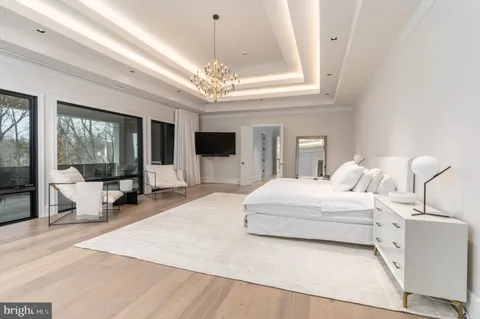 a spacious bathroom with a double vanity sink and a mirror