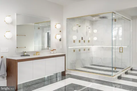 a bedroom with a bed and a potted plant