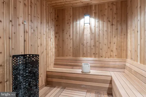 a view of a large dining room with furniture window and outside view