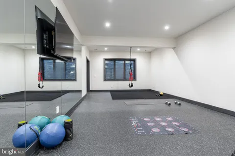 a view of a house with swimming pool and a yard