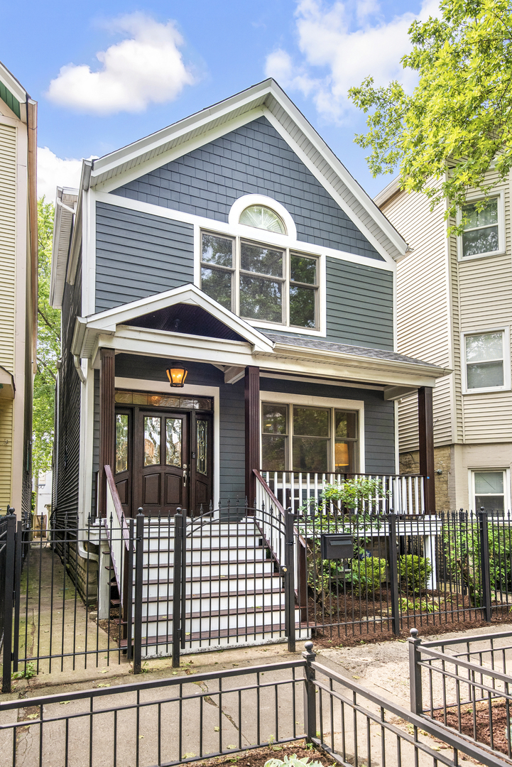 a front view of a house with a porch