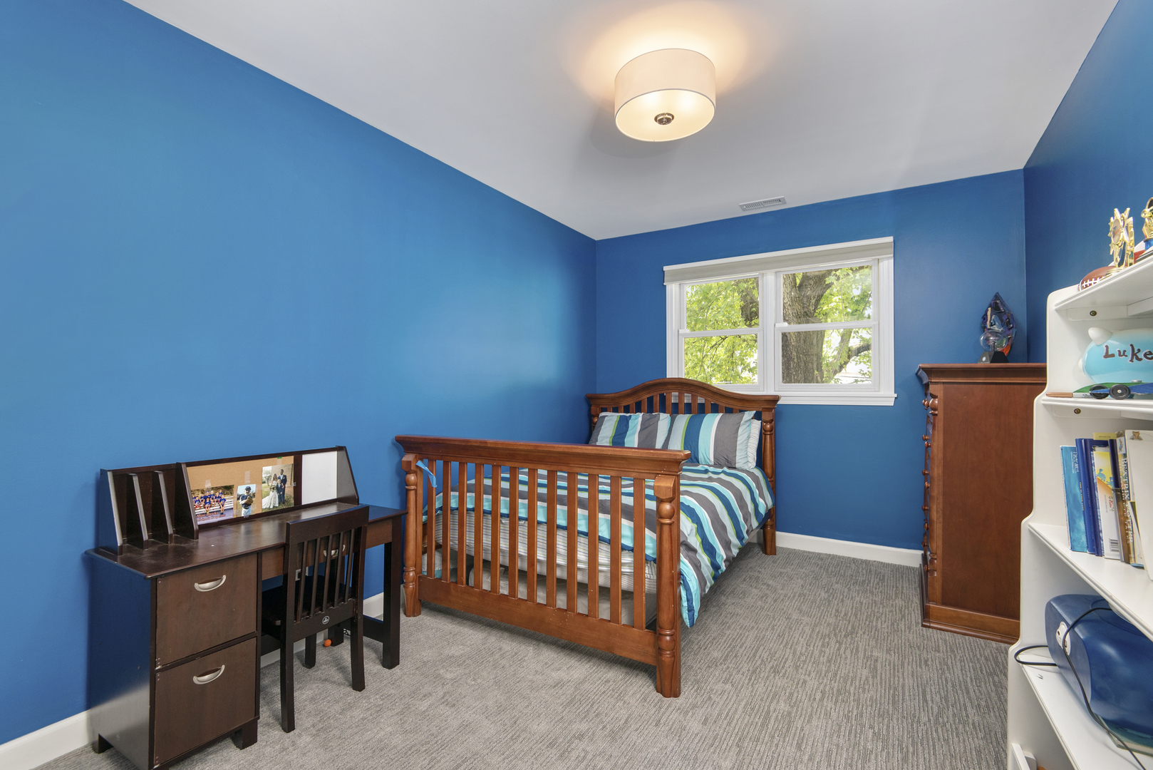 2918 North Racine Avenue Chicago, IL 60657 - Photo 16 of 26 a bedroom with furniture and a window