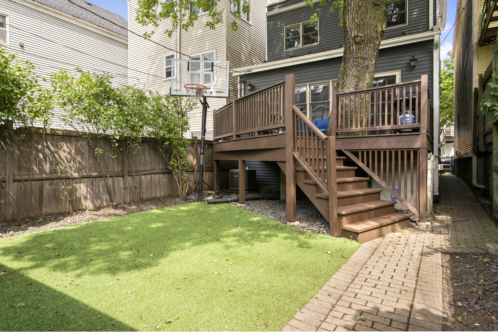 2918 North Racine Avenue Chicago, IL 60657 - Photo 25 of 26 a view of a house with backyard and deck
