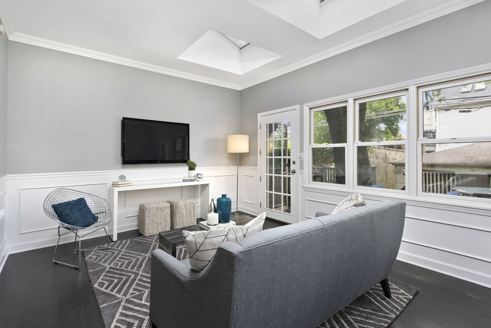 2918 North Racine Avenue Chicago, IL 60657 - Photo 9 of 26 a living room with furniture and a flat screen tv
