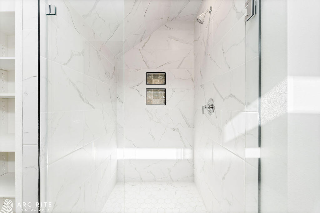 4509 22nd Place Lubbock, TX 79407 - Photo 15 of 32 a bathroom with a bathtub