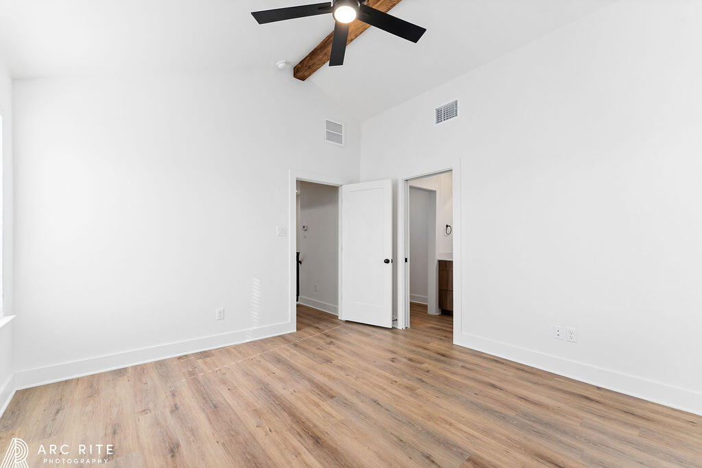 4509 22nd Place Lubbock, TX 79407 - Photo 16 of 32 a view of empty room with wooden floor
