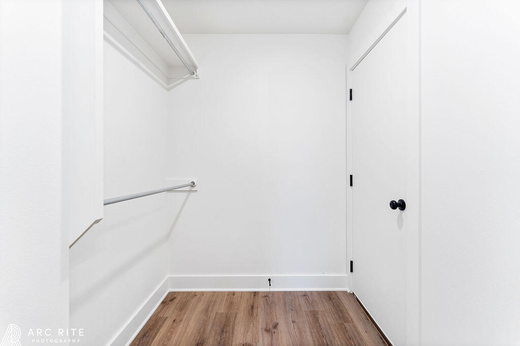 4509 22nd Place Lubbock, TX 79407 - Photo 23 of 32 a view of a room with racks on the wall