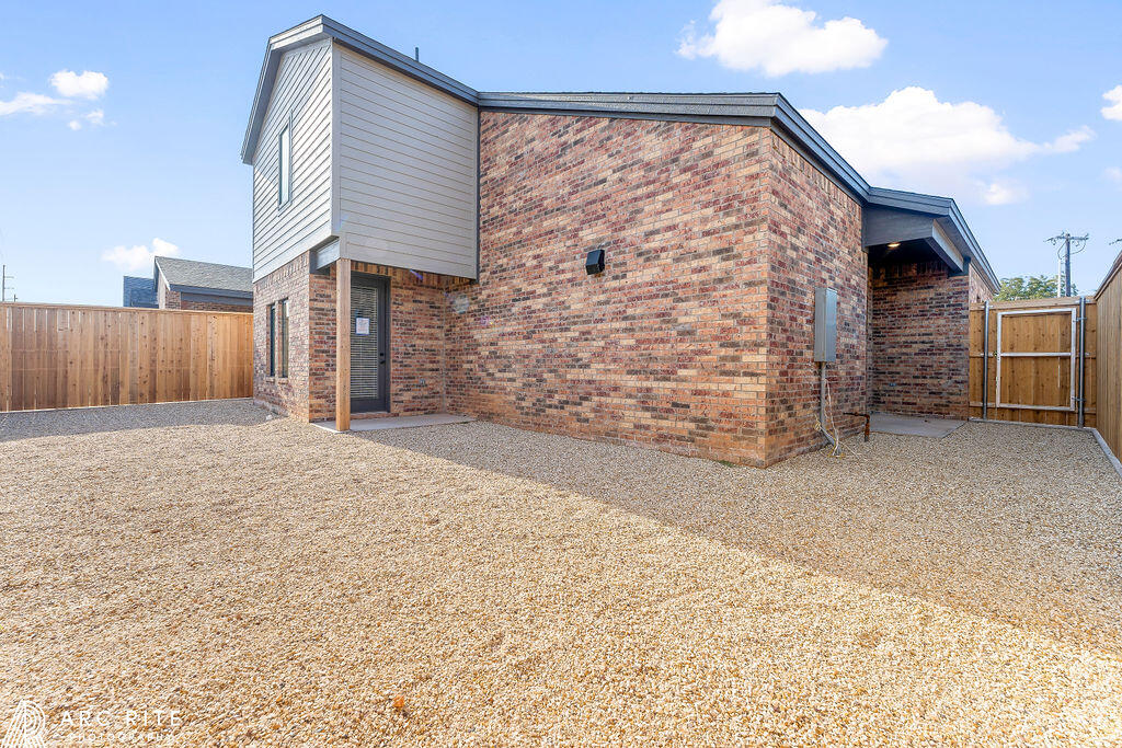 4509 22nd Place Lubbock, TX 79407 - Photo 32 of 32 a view of a backyard of the house