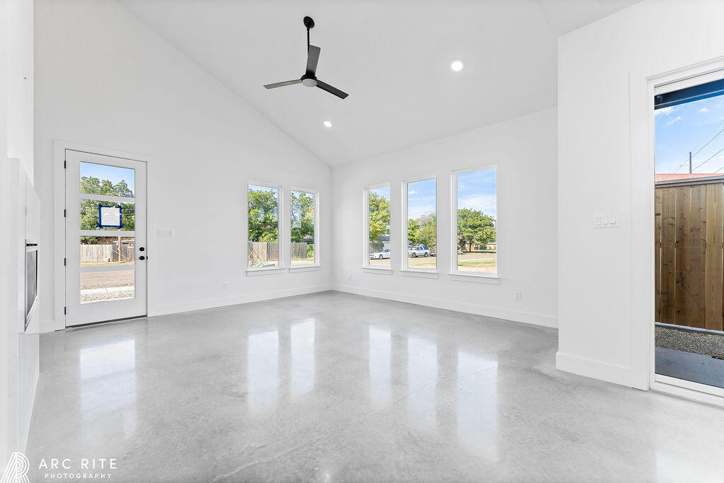 4509 22nd Place Lubbock, TX 79407 - Photo 7 of 32 a view of an empty room with a window