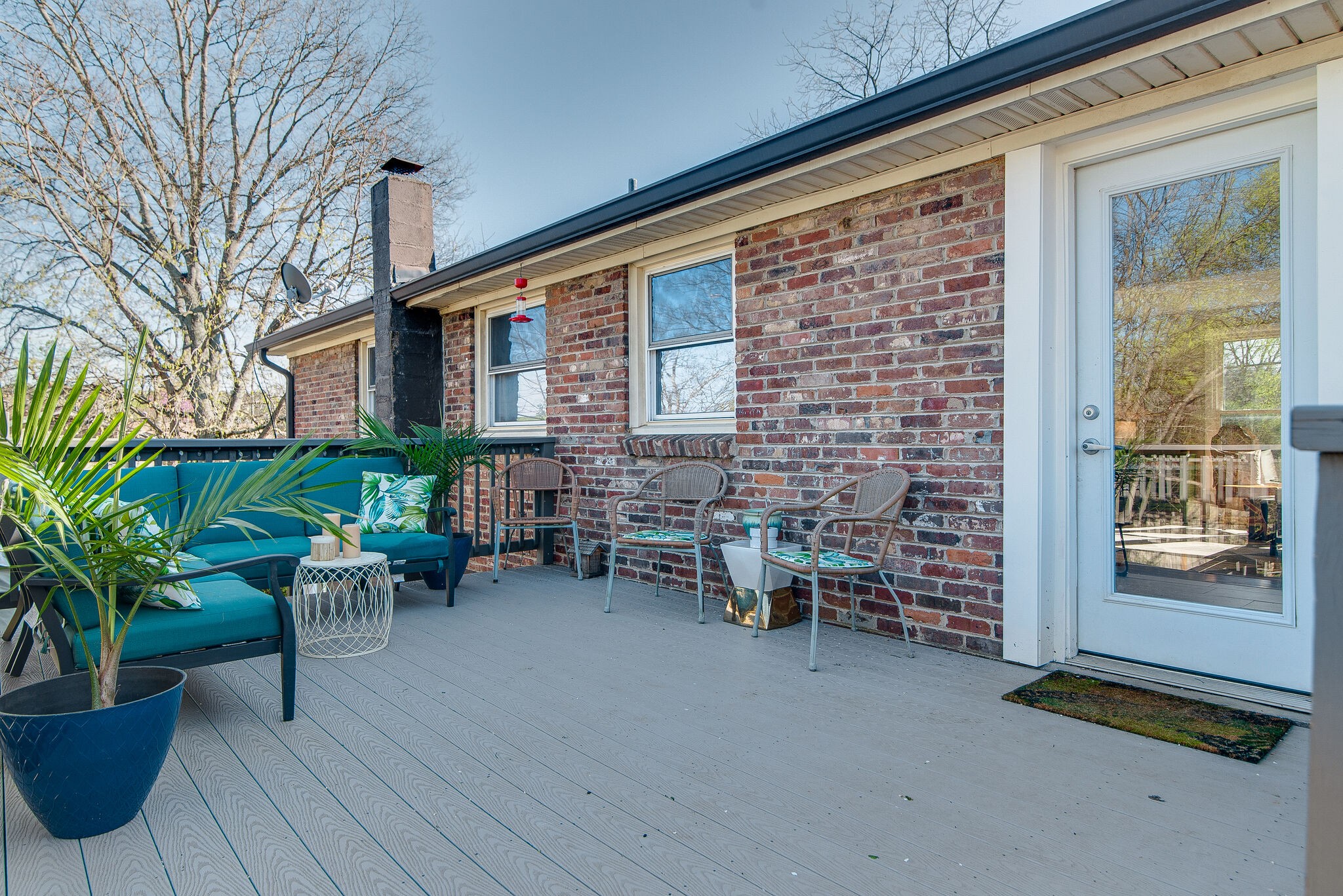 1225 Neelys Bend Road Madison, TN 37115 - Photo 11 of 32 a backyard of a house with outdoor seating