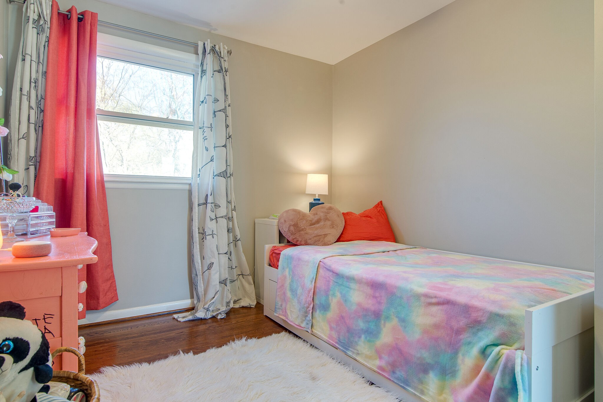 1225 Neelys Bend Road Madison, TN 37115 - Photo 13 of 32 a bedroom with a bed and a window
