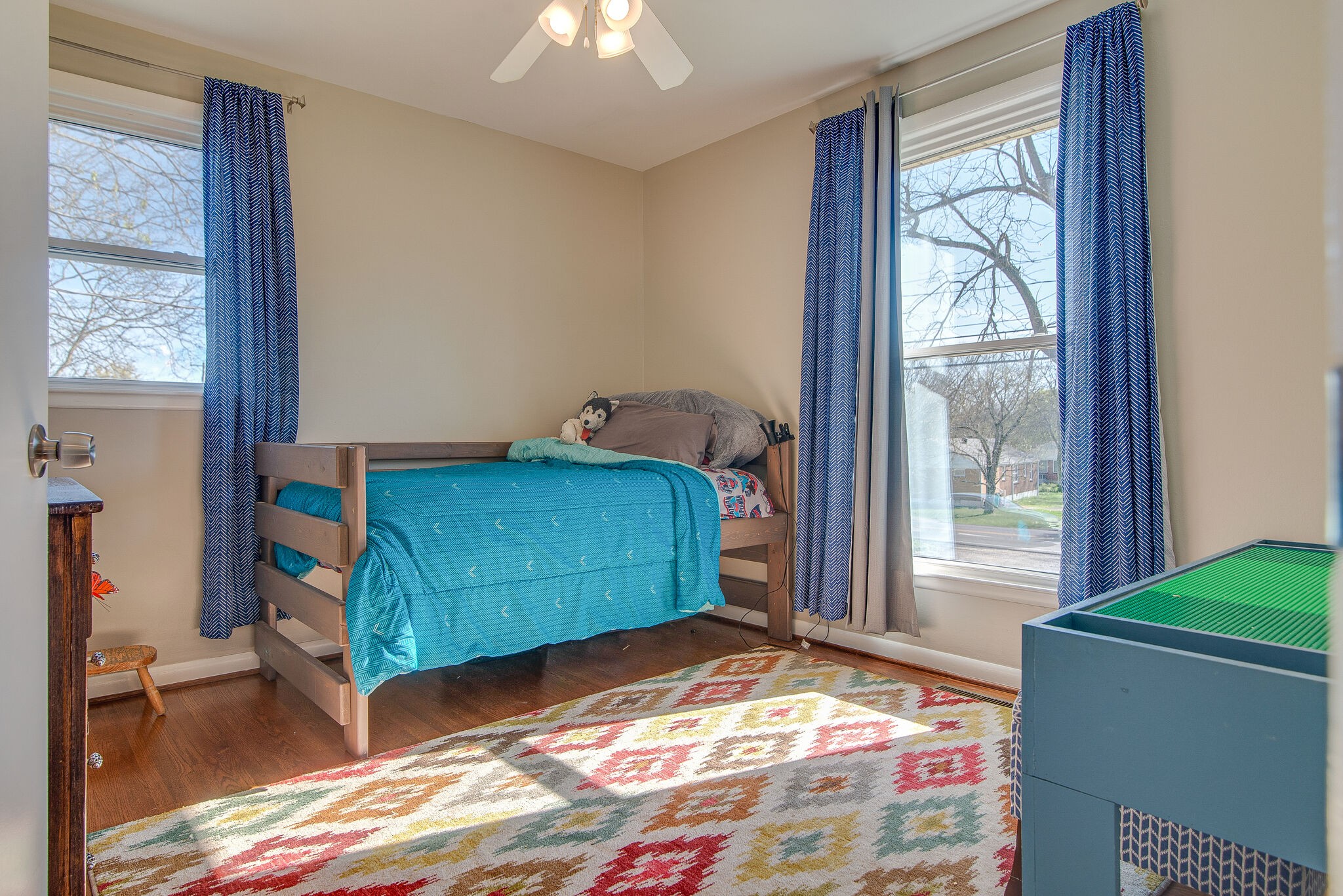 1225 Neelys Bend Road Madison, TN 37115 - Photo 14 of 32 a bedroom with a bed and a window