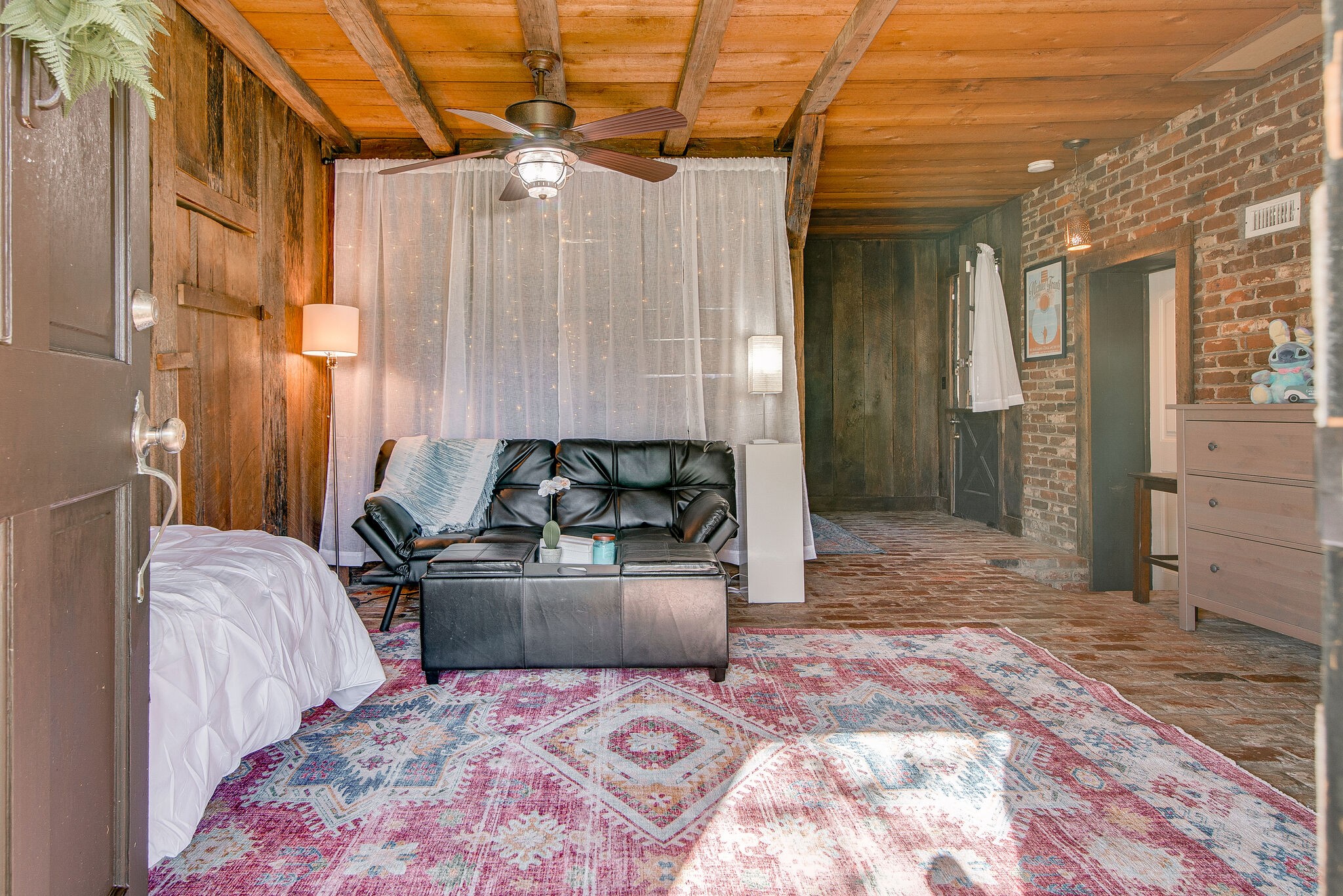 1225 Neelys Bend Road Madison, TN 37115 - Photo 24 of 32 a bedroom with a bed and window