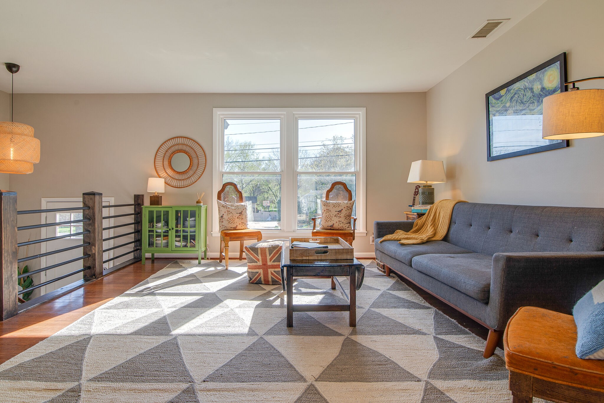 1225 Neelys Bend Road Madison, TN 37115 - Photo 4 of 32 a living room with furniture a rug and a clock