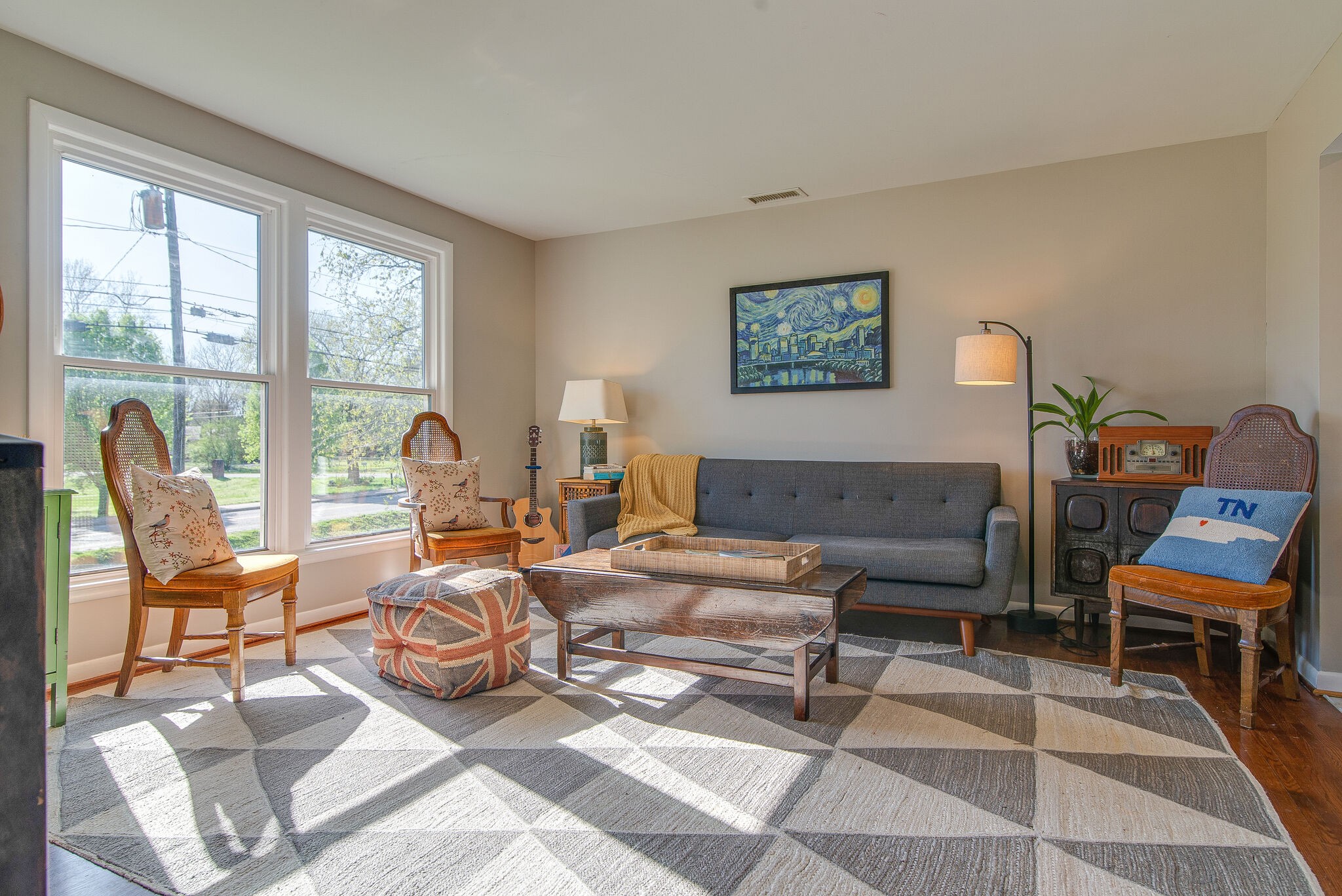 1225 Neelys Bend Road Madison, TN 37115 - Photo 5 of 32 a living room with furniture a rug and a large window