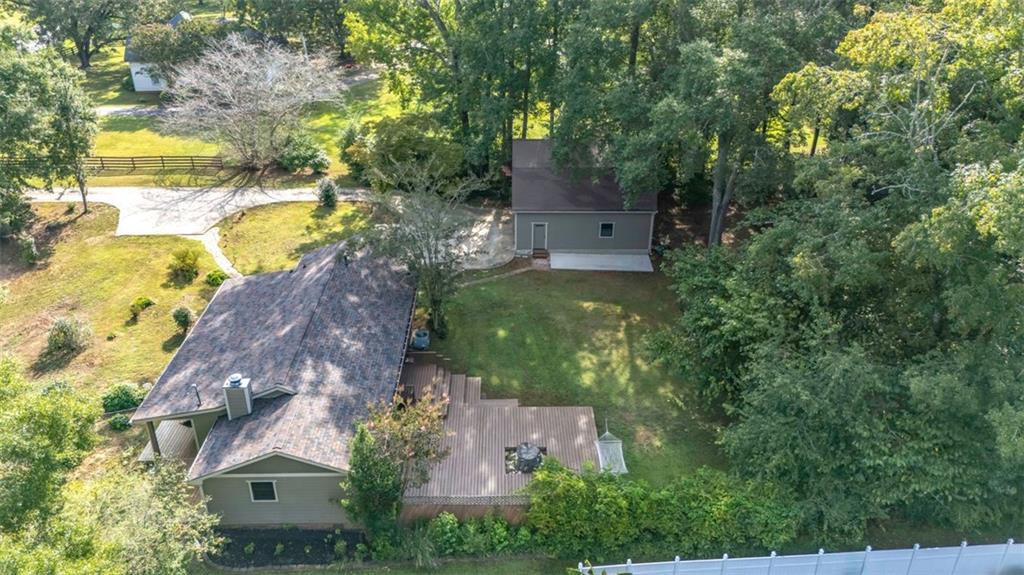 577 West Hickory Level Road Temple, GA 30179 - Photo 1 of 1 an aerial view of residential house with outdoor space and trees all around