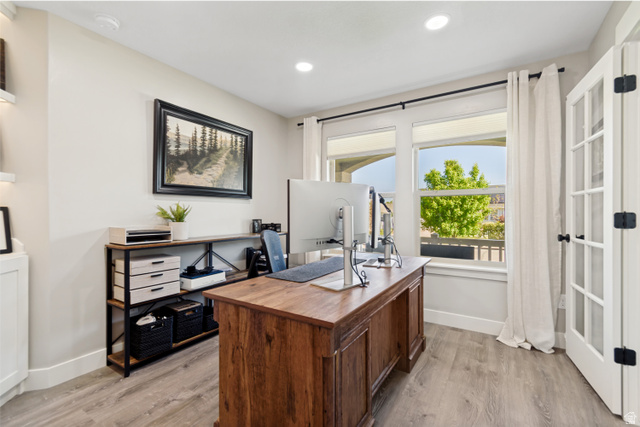 983 West 1550th Street South Springville, UT 84663 - Photo 9 of 43 Light-filled room featuring wood-finish flooring, recessed lighting, and a large window with natural lighting.