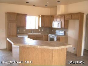 4083 West Sunset Road Yucca, AZ 86438 - Photo 3 of 11 4083 kitchen