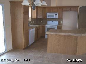 4083 West Sunset Road Yucca, AZ 86438 - Photo 4 of 11 4083 side kitchen