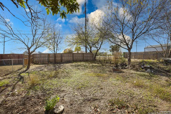 a view of yard covered with snow in outdoor space