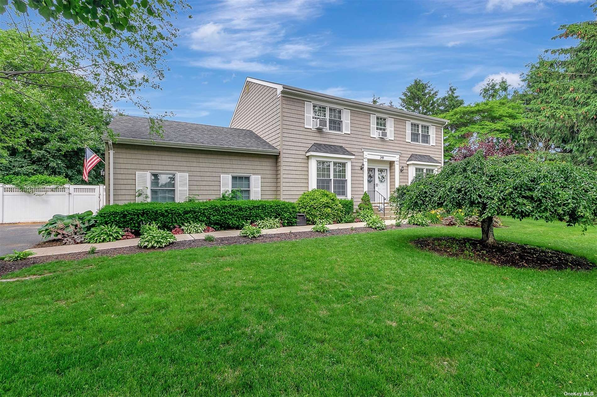 a view of a house with a garden
