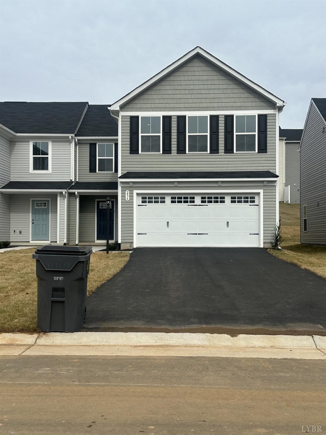 236 Thicket Drive Lynchburg, VA 24501 - Photo 1 of 16 a front view of a house with a yard