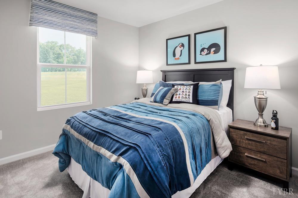 236 Thicket Drive Lynchburg, VA 24501 - Photo 11 of 16 a bedroom with a bed and a window