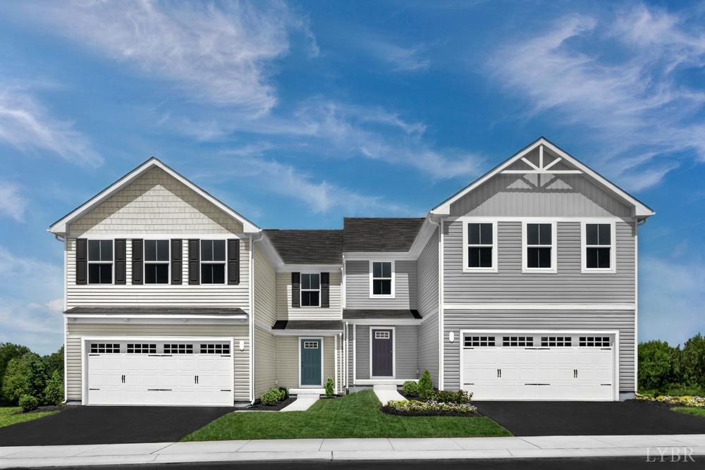236 Thicket Drive Lynchburg, VA 24501 - Photo 2 of 16 a front view of a house with a yard and garage