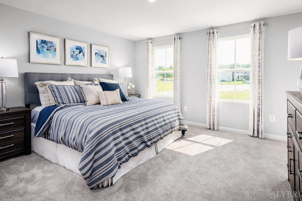 236 Thicket Drive Lynchburg, VA 24501 - Photo 9 of 16 a spacious bedroom with a bed and a window